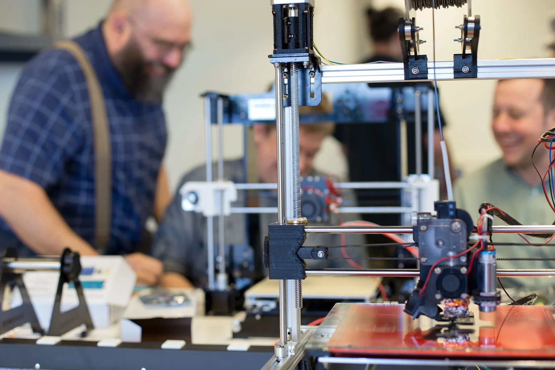 Timeline showing maker movement key milestones from Make magazine launch 2005 to current industrial applications 2026