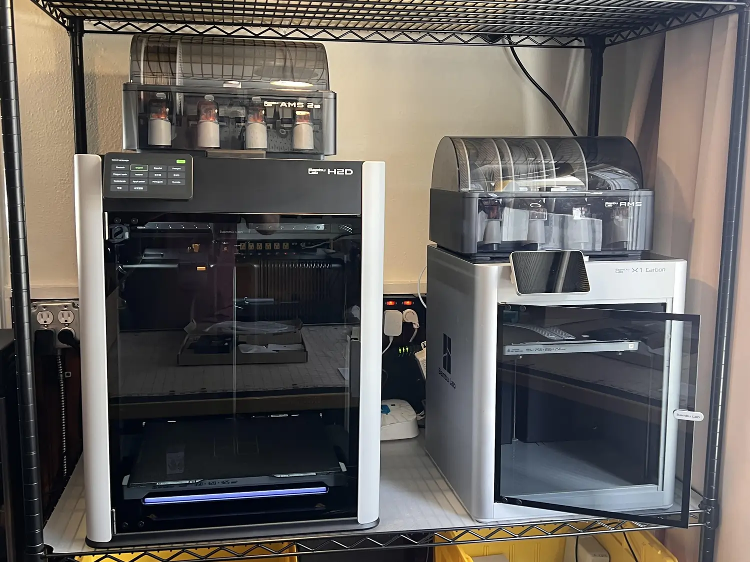 Bambu Lab H2D vs X1 Carbon 2026: Honest Comparison After 200+ Hours